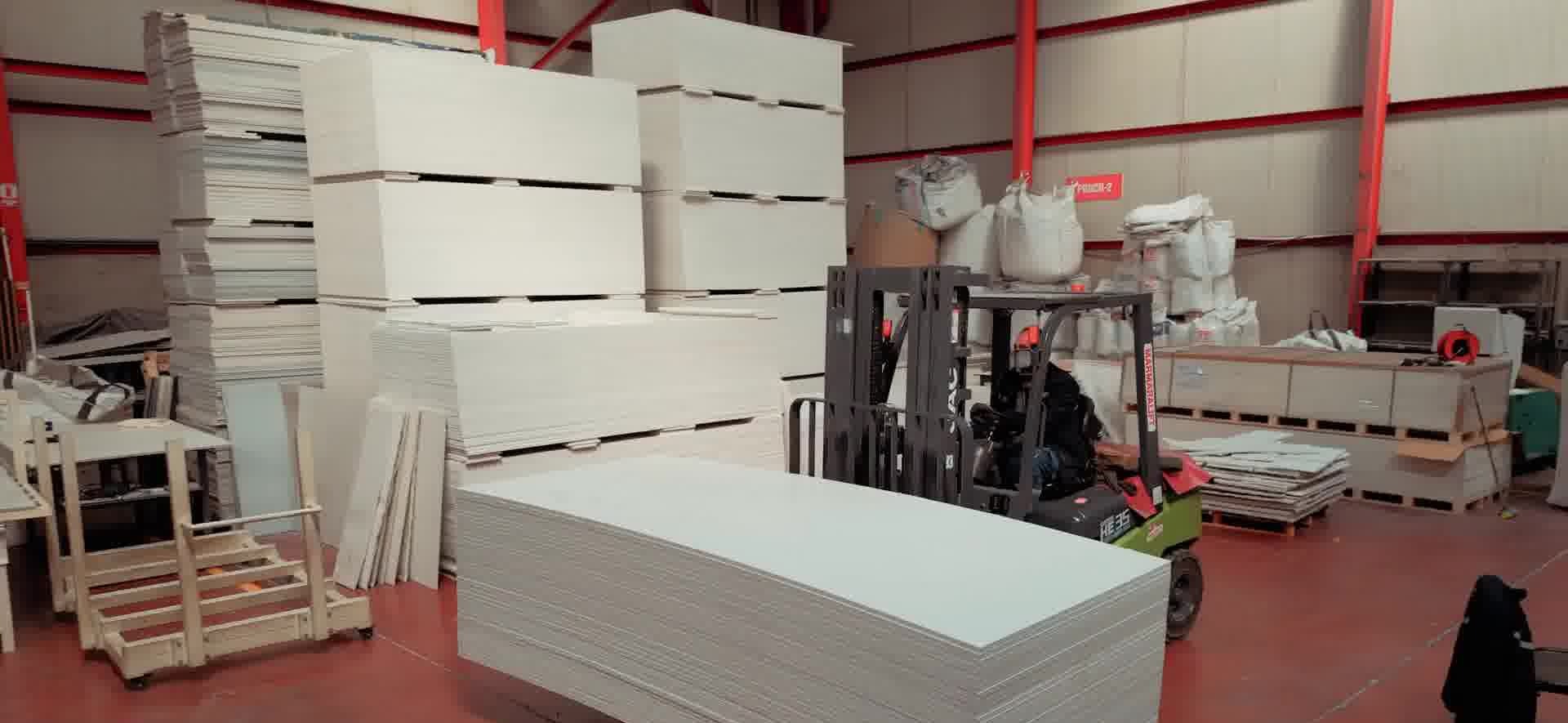 Strapped palletized formwork boards ready for delivery